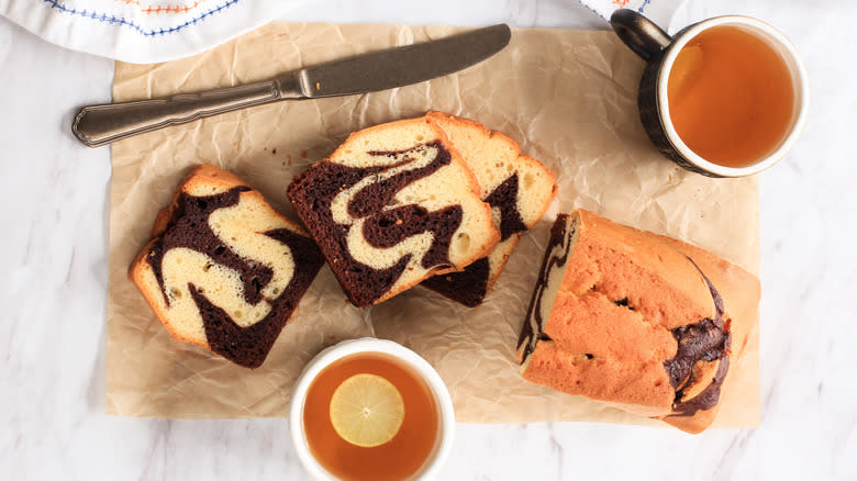 sliced marbled pound cake with tea