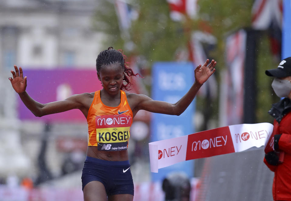 FILE Kenya's Brigid Kosgei crosses the line to win the London Marathon in London, England, Sunday, Oct. 4, 2020. The New York City Marathon women’s record, which has stood for 20 years, could go down Sunday, Nov. 5, 2023 with one of the strongest fields assembled in the history of the race. (Richard Heathcote/Pool via AP, File)