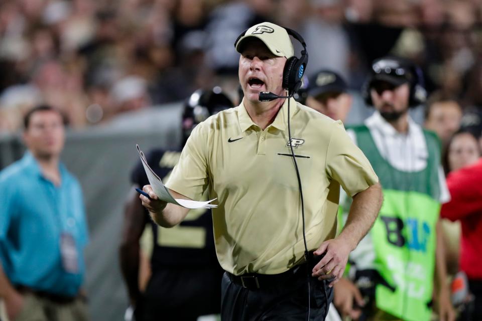 In this photo taken on Sept. 14, 2019, Purdue coach Jeff Brohm yells to an official during the second half of the team's NCAA college football game against TCU in West Lafayette, Ind., Saturday. One big advantage for the Boilermakers: Ohio State, Michigan and Penn State don't appear on the schedule. They open the season by hosting Iowa on Oct. 24. (AP Photo/Michael Conroy)