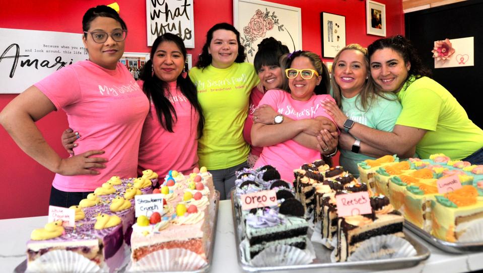 (Left to right) Family members Maria Rosario, Sarai Roblero, Evelynn Gonzales, Angie Robles, Jesmarie Santiago, Rous Robles Lizbethmary Vargas work together as My Sister's Fault cafe/bakery on SW Front St. in Milford.