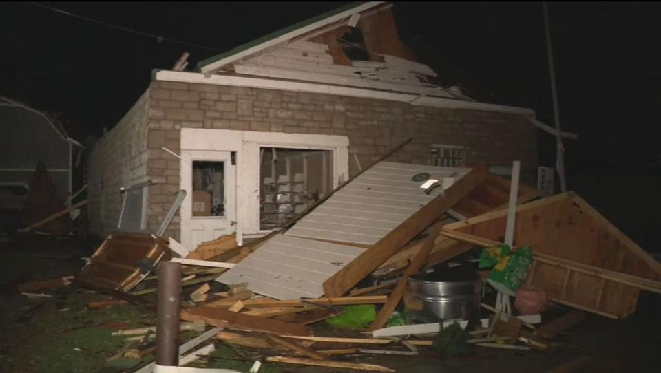 A damaged home in Lakeview, Ohio. At least three people are dead in Ohio after tornadoes tore through Midwest states overnight (AP)