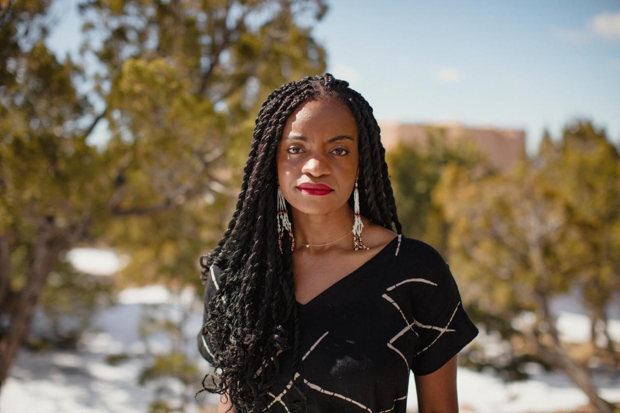 Headshot photo of former Pinterest employee Ifeoma Ozoma