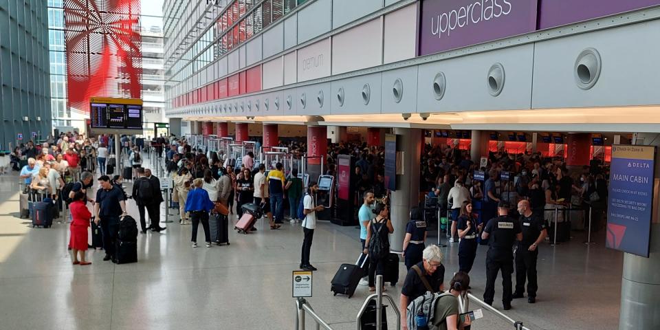 Heathrow Airport queue for Delta chec