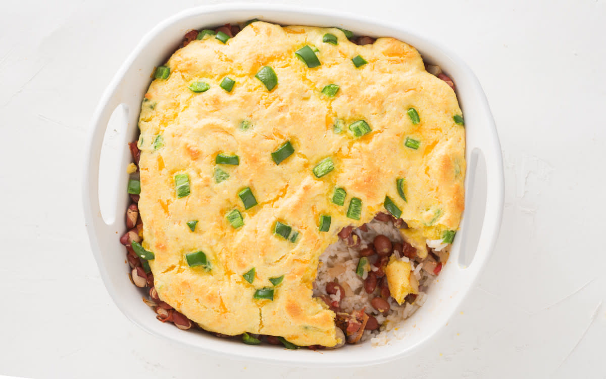 <p>Parade</p><p>Try this Red Beans & Rice Casserole, a bayou classic that gets an upgrade in the form of a cornbread topping. Add hot sauce to the beans to crank up the heat.</p><p><strong>Get the recipe: <a href="https://parade.com/842584/jocelynruggiero/red-beans-rice-casserole/" rel="nofollow noopener" target="_blank" data-ylk="slk:Red Beans and Rice Casserole;elm:context_link;itc:0;sec:content-canvas" class="link rapid-noclick-resp">Red Beans and Rice Casserole</a></strong></p>