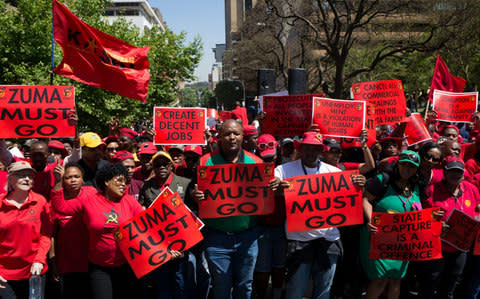 The South African COSATU union protests in Johannesburg against the leadership of President Jacob Zuma - Credit: Cornell Tukiri/EPA