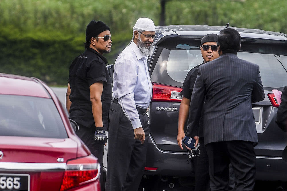 Dr Zakir Naik arrives at Bukit Aman police headquarters in Kuala Lumpur August 22, 2019. — Picture by Hari Anggara