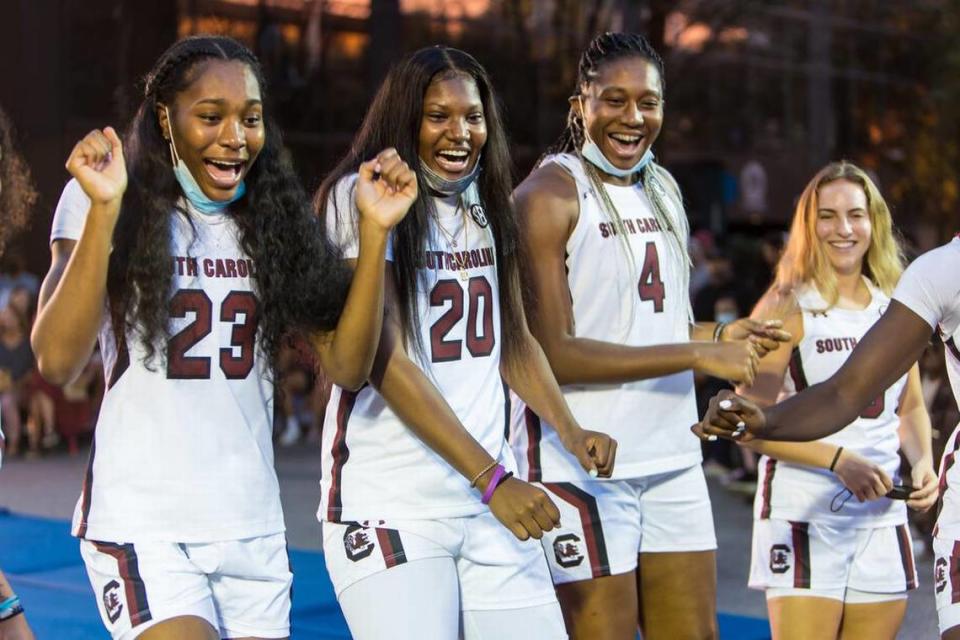 From 2021, South Carolina Gamecocks players Bree Hall, Sania Feagin and Aliyah Boston interact with fans during the Gamecock Basketball Madness on Main Street in downtown Columbia.