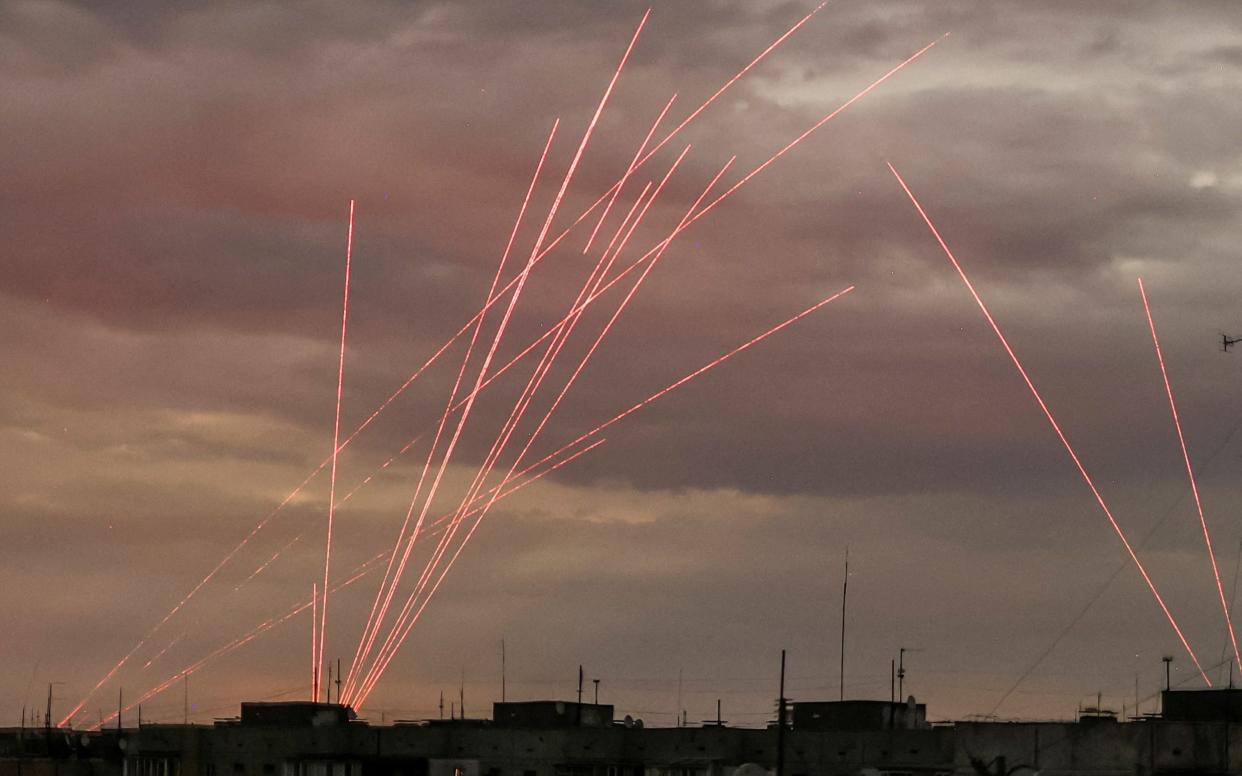 Paths of bullets are seen during a Russian drone strike on the city that has been the focus of relentless attacks in recent months