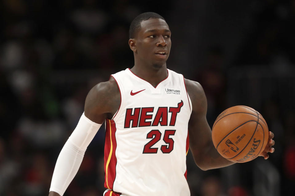Miami Heat guard Kendrick Nunn brings the ball up during the second half of the team's NBA basketball game against the Atlanta Hawks on Thursday, Oct. 31, 2019, in Atlanta. Nunn's 112 points are the highest total through the first five games for any undrafted player in NBA history. Miami won 106-97. (AP Photo/John Bazemore)
