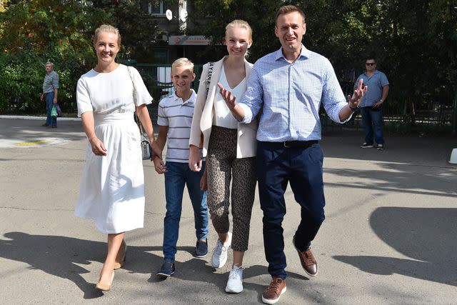 <p>VASILY MAXIMOV/AFP via Getty </p> Russian opposition activist Alexei Navalny (R), his daughter Daria (2R), son Zakhar (2L) and wife Yulia (L) in 2019