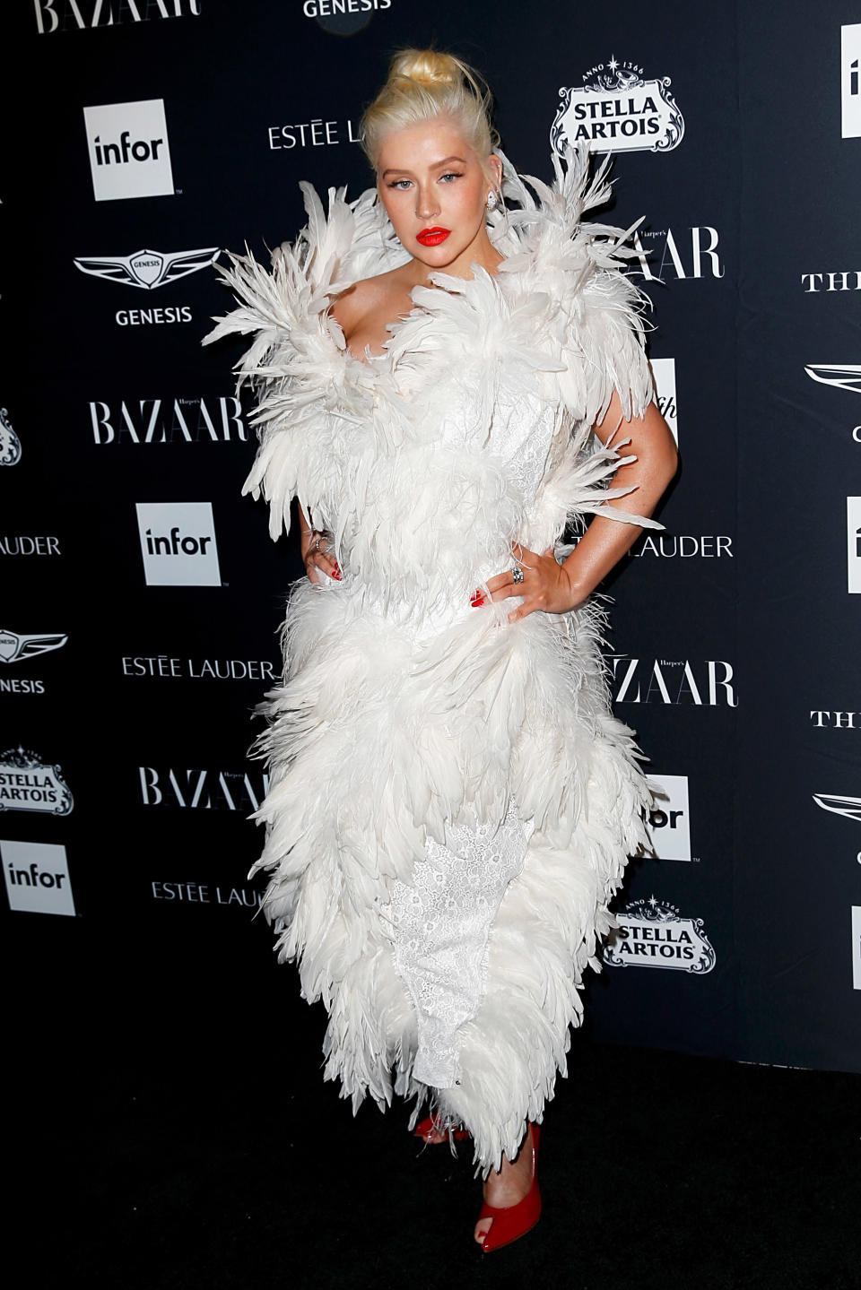 <p>The singer turned heads in a feathery Vivienne Westwood number. <em>[Photo: Getty]</em> </p>