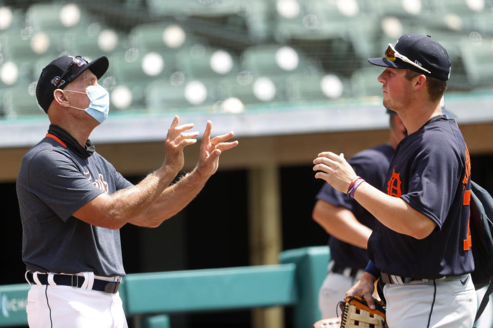 Detroit Tigers' Alan Trammel, special assistant to the general manager, left, talks with Spencer Torkelson after an intrasquad baseball game in Detroit, Monday, July 13, 2020. (AP Photo/Paul Sancya)