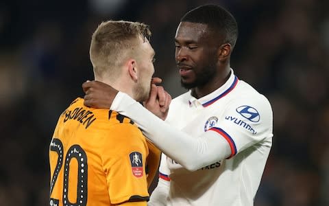 Fikayo Tomori chats with Hull City's Jarrod Bowen after the match - Credit: action images