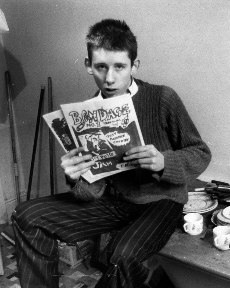 Shane MacGowanin 1977, aged 19, with his fanzine Bondage.