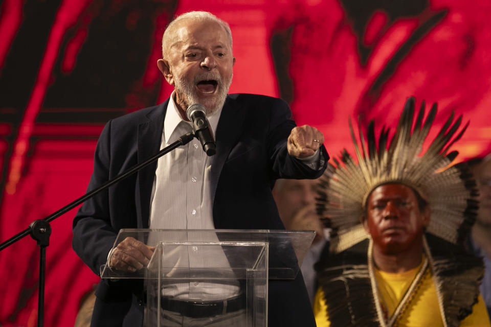 Brazil's President Luiz Inacio Lula da Silva speaks during a ceremony celebrating the return of the Indigenous Tupinamba people's sacred cloak to Brazil, in Rio de Janeiro, Thursday, Sept. 12, 2024. The garment, made from bird feathers and plant fibers, was repatriated to Brazil after having spent more than 300 years in the National Museum of Denmark. (AP Photo/Bruna Prado)