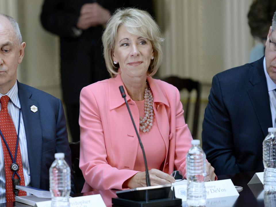 Betsy DeVos sought to slash the federal education budget and divert billions of dollars in tax credits to pay for subsidised tuition to for-profit private schoolsOlivier Douliery-Pool/Getty Images