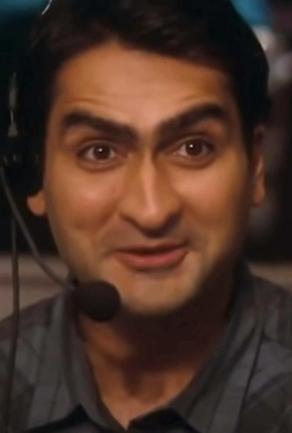 Nanjiani wearing a headset in a control booth