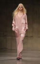 <b>LFW AW13: Topshop Unique </b><br><br>Would you wear this pink pyjama style jumpsuit?<br><br>© PA