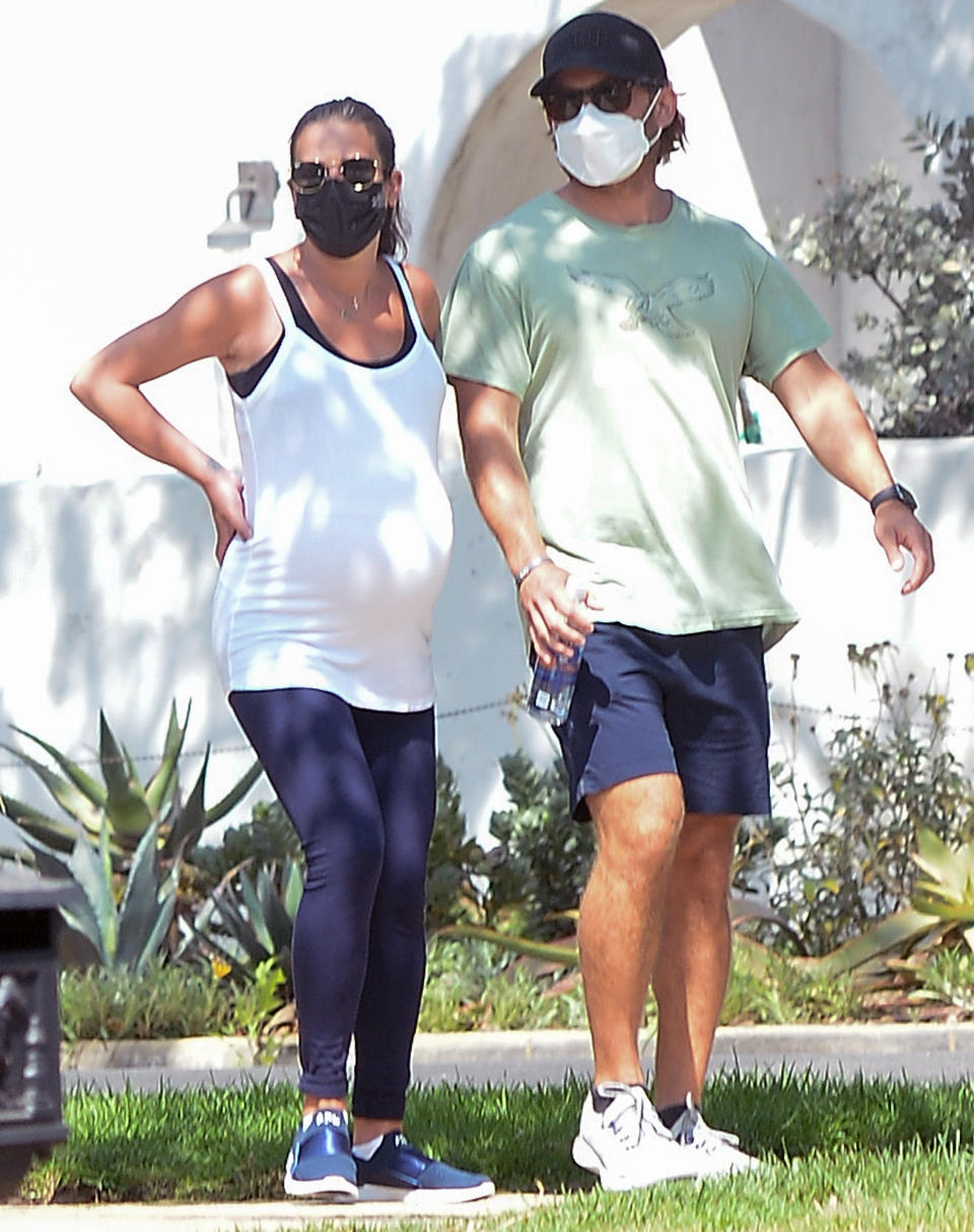 <p>Parents-to-be Lea Michele and Zandy Reich take a walk around their Los Angeles neighborhood on Monday.</p>