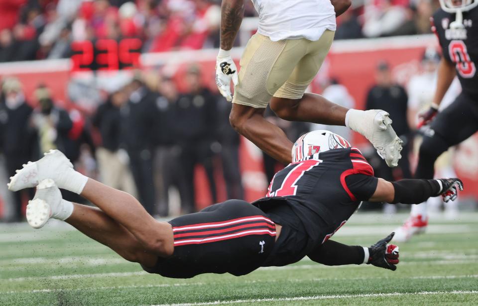 Utah Utes cornerback Smith Snowden (17) makes a diving tackle in Salt Lake City on Saturday, Nov. 25, 2023. Utah won 23-17. | Jeffrey D. Allred, Deseret News