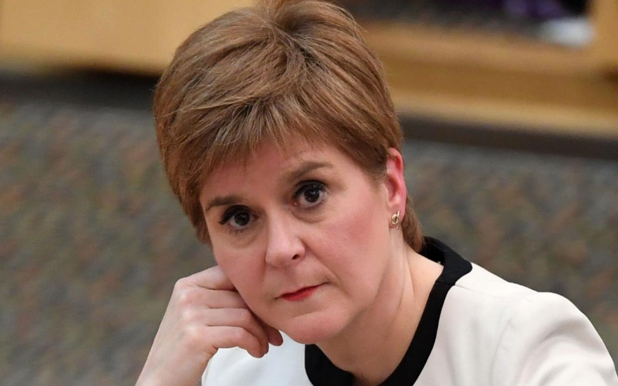 Nicola Sturgeon will review her lockdown restrictions on Thursday - AFP