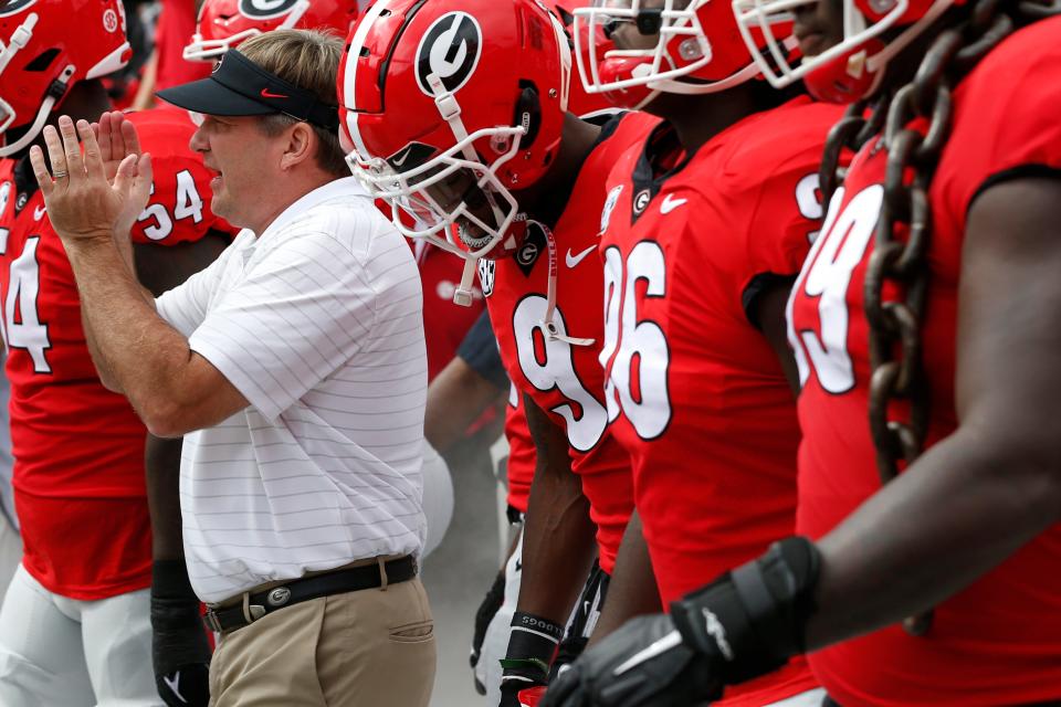 Oct 2, 2021; Athens, GA, USA; Georgia coach Kirby Smart gets ready to lead his team onto the field before the first half of an NCAA college football game between Arkansas and Georgia in Athens, Ga., on Saturday, Oct. 2, 2021. Joshua L. Jones-USA TODAY Sports