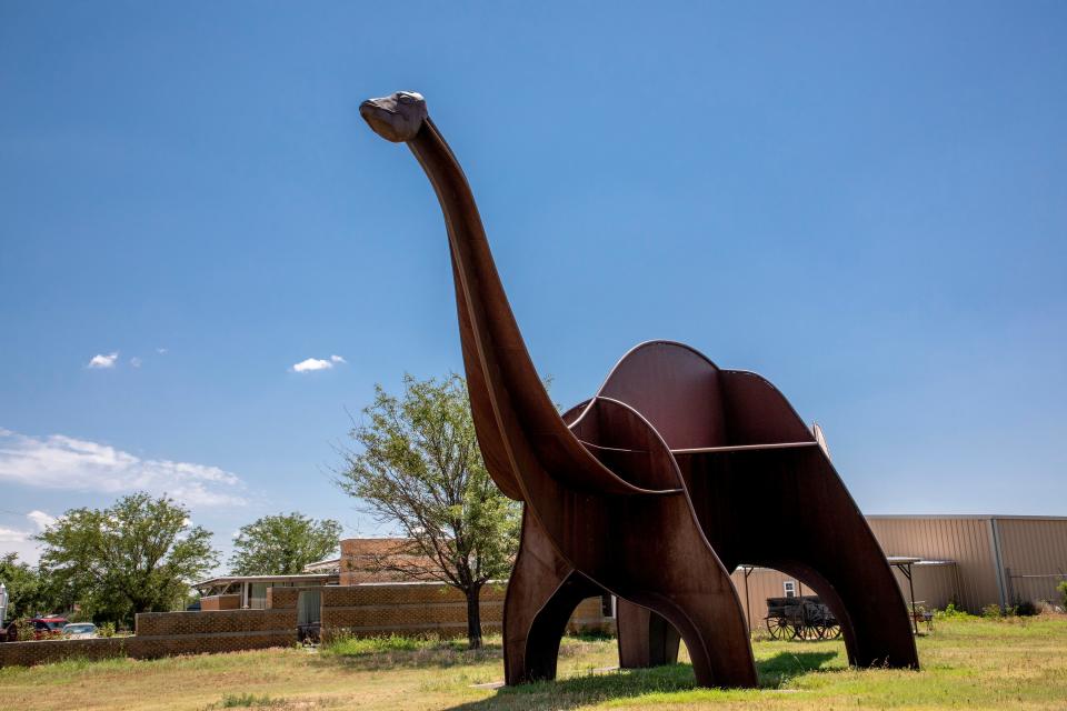 As soon as you enter Cimarron Heritage Center Museum in Boise City, you'll be greeted by a giant metal Apatosaurus that looms just beyond the welcome sign.