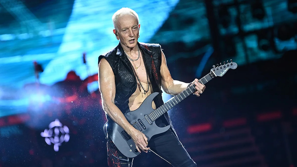  Phil Collen of Def Leppard performs onstage during the "Summer Stadium" tour at Truist Park on July 13, 2024 in Atlanta, Georgia. 