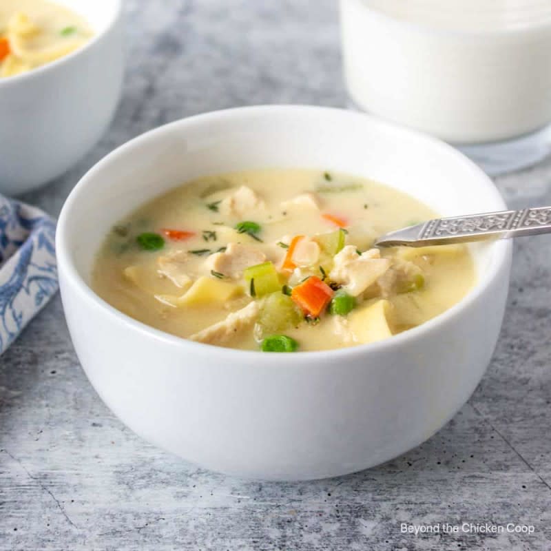<p>Beyond The Chicken Coop</p><p>A delicious creamy chicken noodle soup made with egg noodles, leftover chicken, and veggies in a tasty broth.</p><p><strong>Get the recipe: <a href="https://www.beyondthechickencoop.com/creamy-chicken-noodle-soup" rel="nofollow noopener" target="_blank" data-ylk="slk:Creamy Chicken Noodle Soup;elm:context_link;itc:0;sec:content-canvas" class="link rapid-noclick-resp">Creamy Chicken Noodle Soup</a></strong></p>