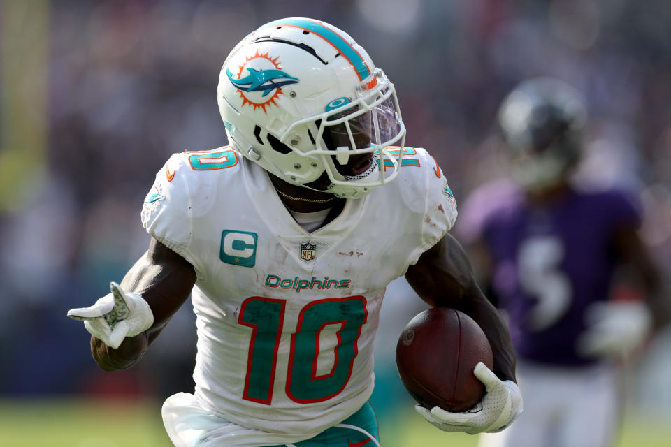 Wide receiver Tyreek Hill of the Miami Dolphins celebrates while scoring his second touchdown in a win over the Ravens last season. (Photo by Rob Carr/Getty Images)