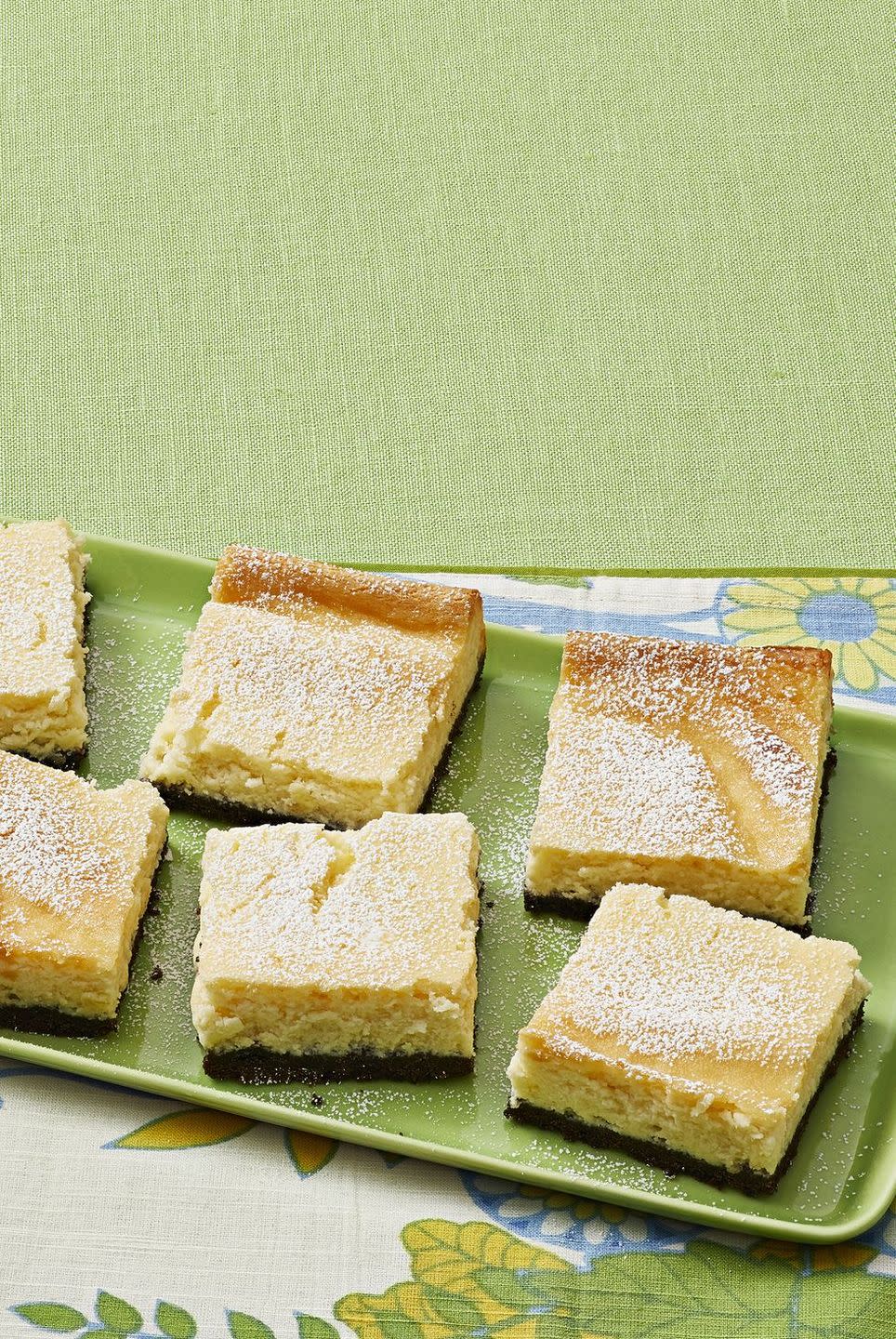 key lime pie cheesecake bars on green plate