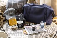 <p>Next morning we were up and at 'em! Every guest at the Hudson Quattrocento received a luxury tote bag full of delights, including Road & Track clothing and delicious cold-brew coffee. </p>