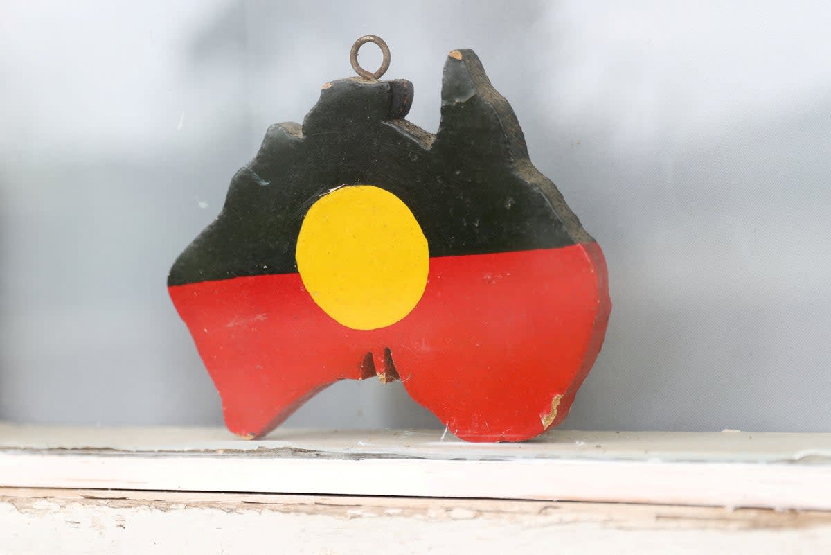 FILE: A depiction of the Australian Aboriginal Flag is seen on a window sill in Sydney (REUTERS)