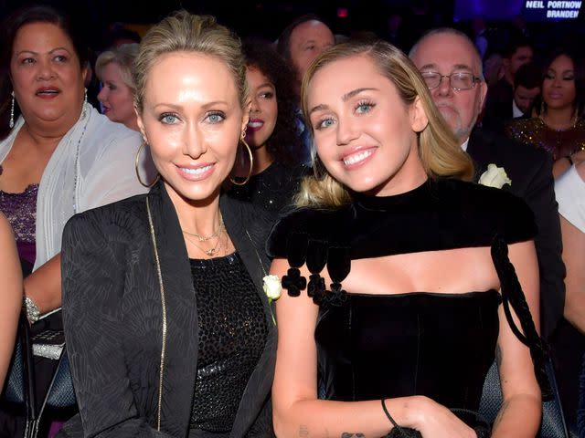 <p>Lester Cohen/Getty </p> Tish Cyrus and Miley Cyrus attend the 60th Annual GRAMMY Awards