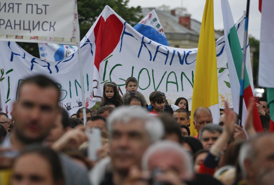 Faithful gather to see Pope Francis in Sofia, Bulgaria, Sunday, May 5, 2019. Pope Francis is visiting Bulgaria, the European Union's poorest country and one that taken a hard line against migrants, a stance that conflicts with the pontiff's view that reaching out to vulnerable people is a moral imperative. (AP Photo/Darko Vojinovic)