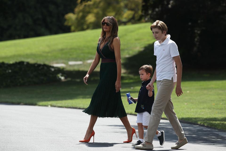 First Lady Melania Trump walks with son Barron, and grandson Joseph Frederick Kushner towards the Marine One on the South Lawn of the White House prior to a leaving Aug. 25, 2017, in Washington, D.C. President Trump is spending the weekend with his family at Camp David. 