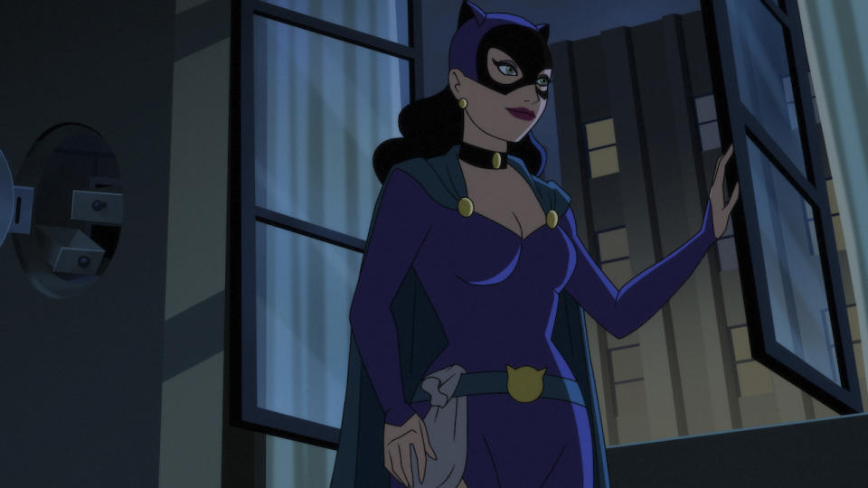 Purple-costumed Catwoman standing next to open window in Batman: Caped Crusader