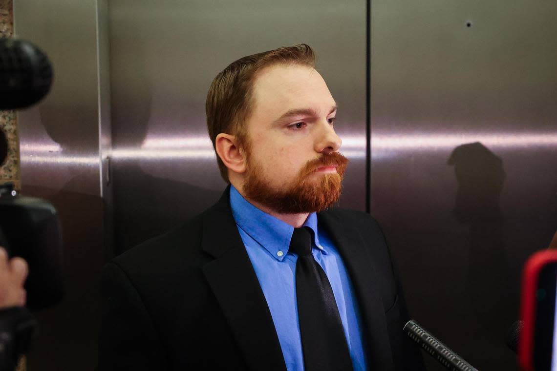 Former Fort Worth police officer Aaron Dean waits by the elevators after a hearing in his case on Nov. 16, 2021. He is charged with murder in the October 2019 shooting of Atatiana Jefferson.