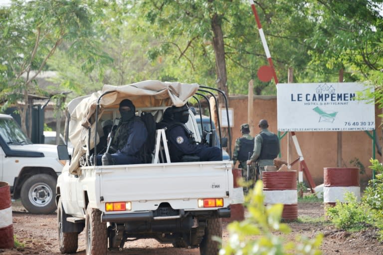 Malian police enter the Kangaba tourist resort just east of the capital Bamako a day after the assault which began on Sunday