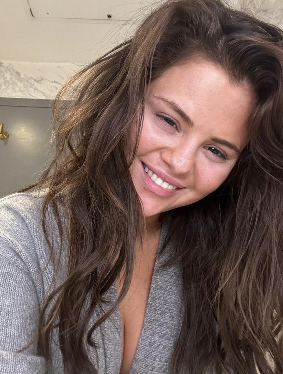 Selena Gomez smiles in a makeup-free selfie.