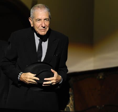 Canadian singer-songwriter Leonard Cohen attends a tribute in Gijon, northern Spain on October 19, 2011. REUTERS/Eloy Alonso/File Photo