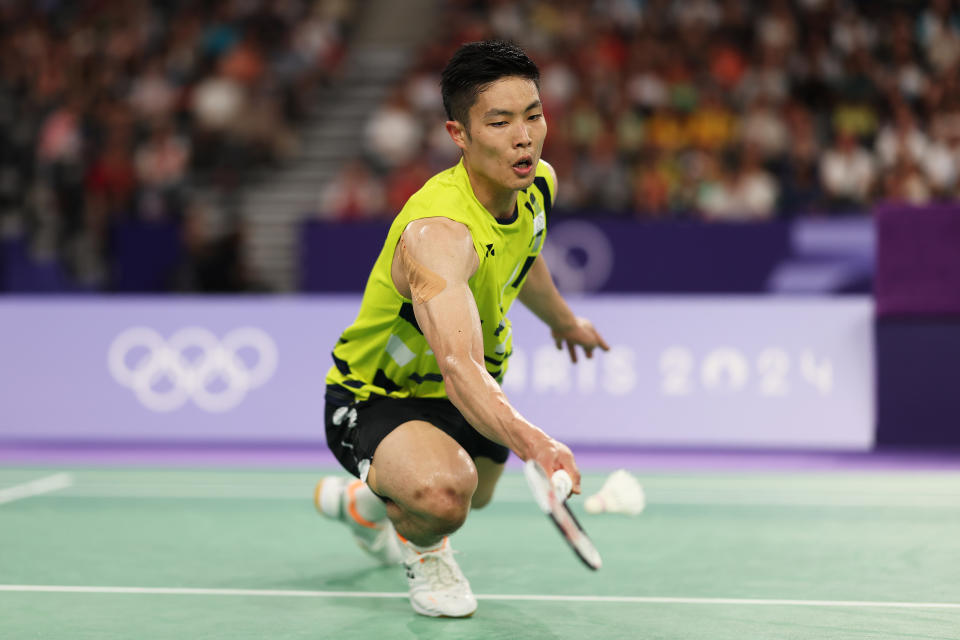 PARIS, FRANCE - AUGUST 02: Chou Tien Chen of Team Chinese Tapei plays a shot during the Badminton Men's Singles Quarterfinal  match against Lakshya Sen of Team India on day seven of the Olympic Games Paris 2024 at Porte de La Chapelle Arena on August 02, 2024 in Paris, France. (Photo by Julian Finney/Getty Images)