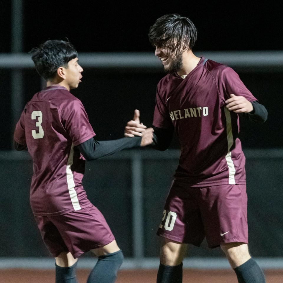 Adelanto’s Damian Espinoza, left and David Barajas celebrate after scoring against Silverado during the first half on Friday, Jan. 13, 2023.