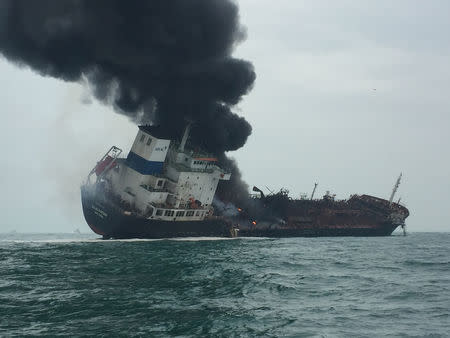 An oil tanker on fire is seen near Lamma island, Hong Kong, China January 8, 2019. Hong Kong Police Force/Handout via REUTERS