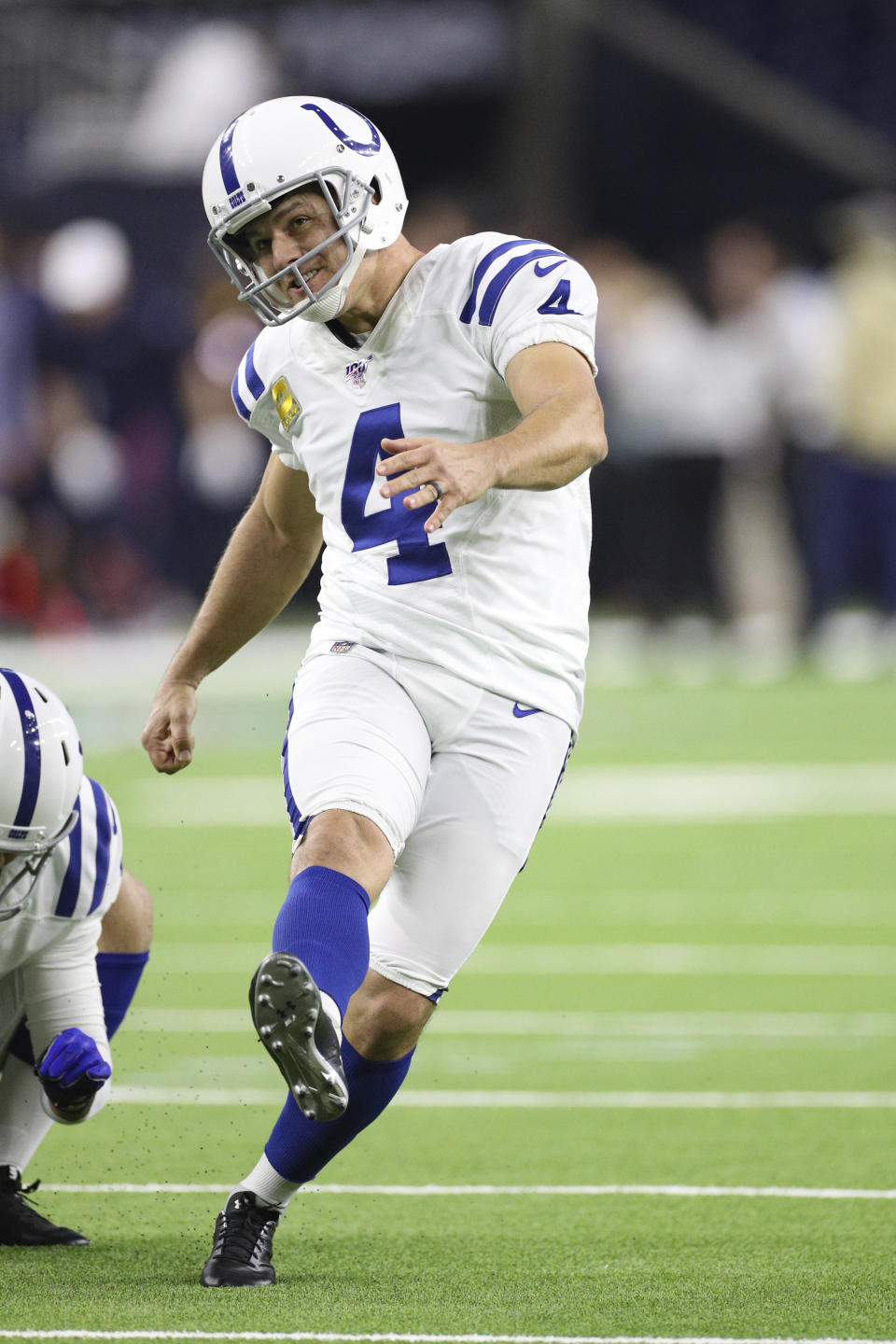 Indianapolis Colts kicker Adam Vinatieri (4) kicks a field goal during warm-ups in an NFL game against the Houston Texans, Thursday, Nov. 21, 2019 in Houston. The Texans defeated the Colts 20-17. (Margaret Bowles via AP)