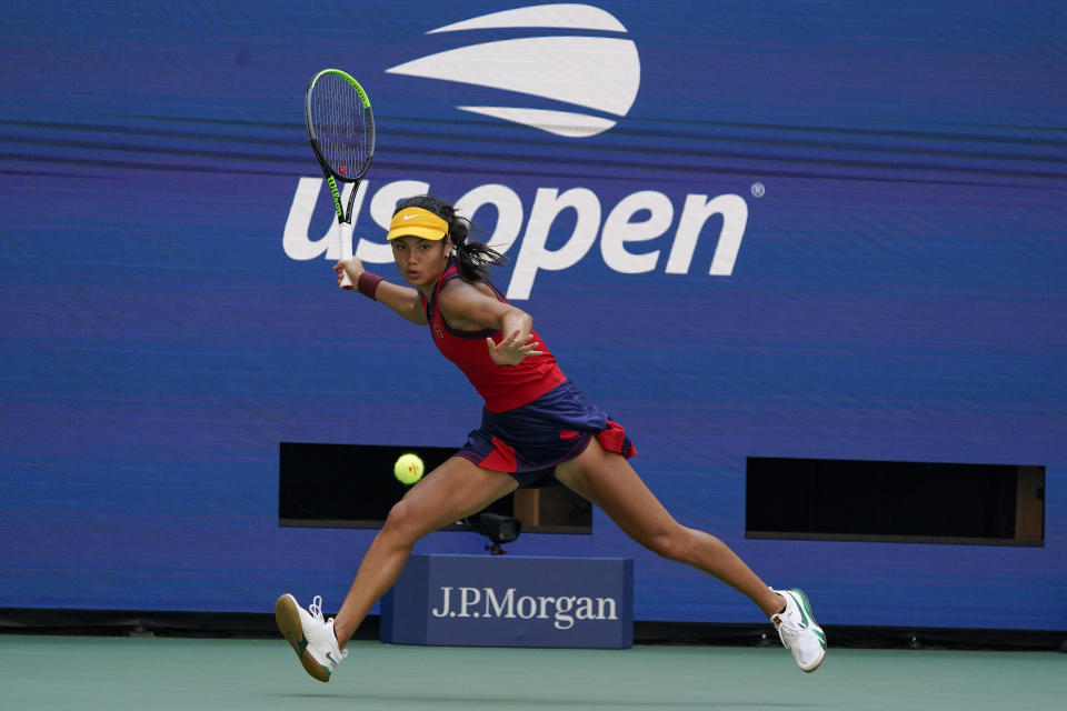 Emma Raducanu, of Great Britain, returns a shot to Belinda Bencic, of Switzerland, during the quarterfinals of the US Open tennis championships, Wednesday, Sept. 8, 2021, in New York. (AP Photo/Elise Amendola)