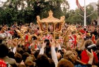<p>Crowds hailing Queen Elizabeth II as she and Prince Philip ride past in the Gold State Coach during the Queen's Silver Jubilee procession from Buckingham Palace to St Paul's Cathedral, London, 7th June 1977.</p>