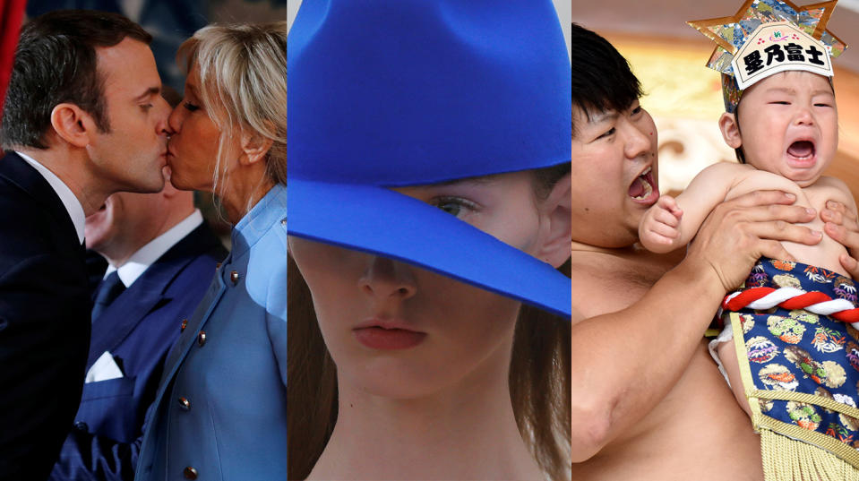 French kiss, split brim, cry-baby sumo & more — it happened today: May 14 in pictures