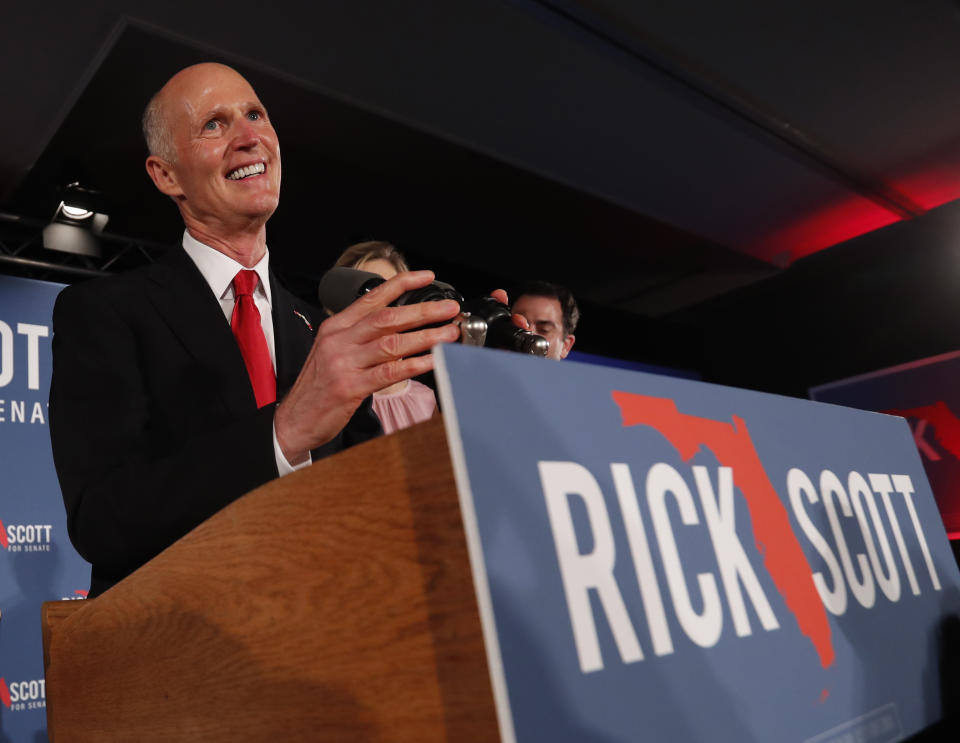 Republican Senate candidate Rick Scott smiles as he speaks to supporters at an election watch party, Wednesday, Nov. 7, 2018, in Naples, Fla. (AP Photo/Wilfredo Lee)