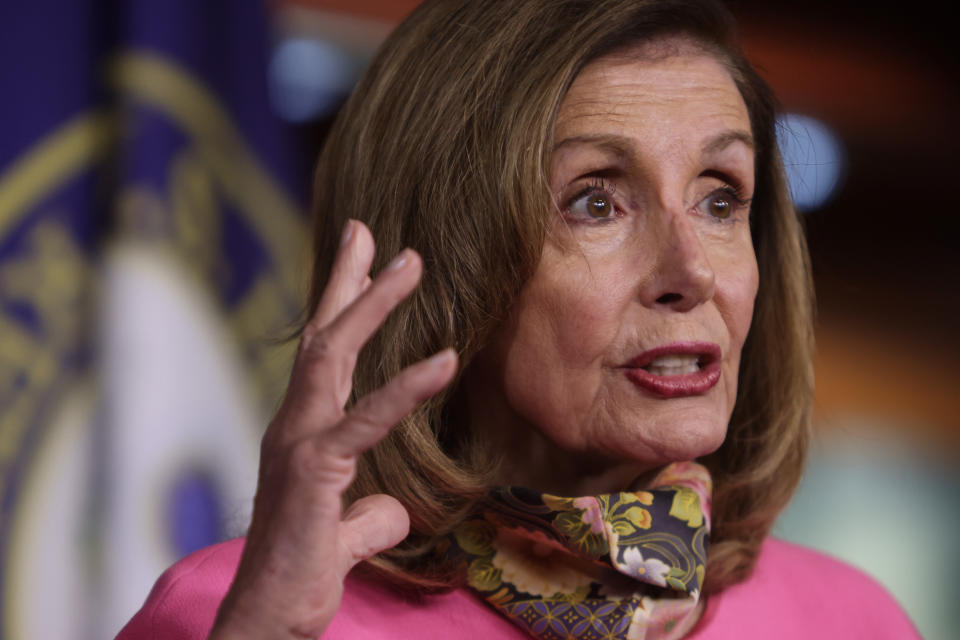 Speaker of the House Nancy Pelosi (D-Calif.) participates in a news conference on Friday. She -- along with Treasury Secretary Steven Mnuchin, Senate Minority Leader Sen. Chuck Schumer and White House Chief of Staff Mark Meadows -- are trying to negotiate an agreement to move forward on a new relief package to help people and businesses weather the COVID-19 pandemic. (Photo: Alex Wong via Getty Images)